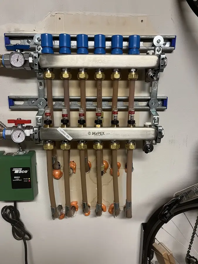 Plumber performing Gas Line Installation at a residential property in Edgewater